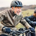 older people enjoying riding their ebikes